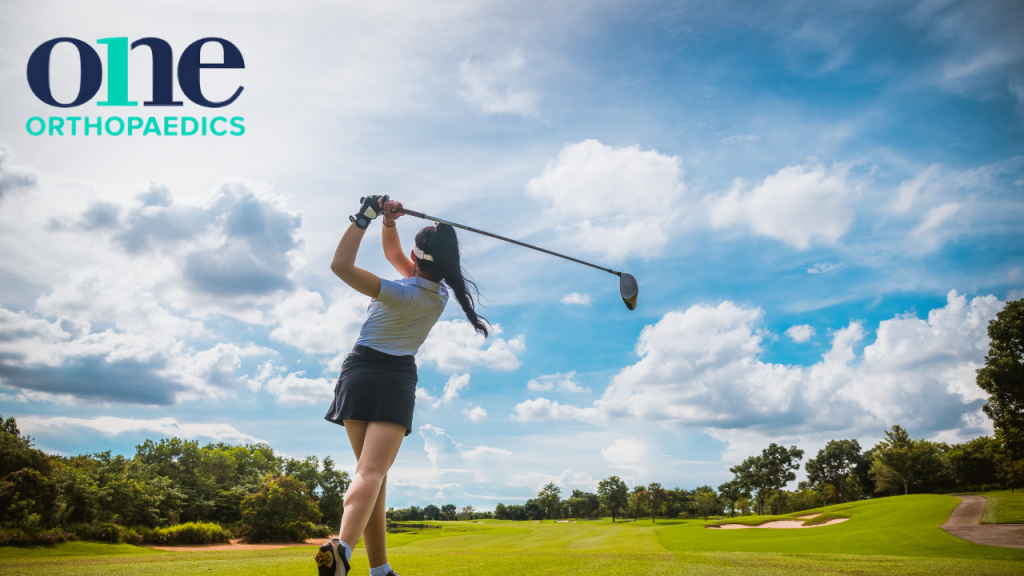 Person playing golf on a sunny but moderately cloudy day, with a OneOrthopaedics clinic logo superimposed on the image.